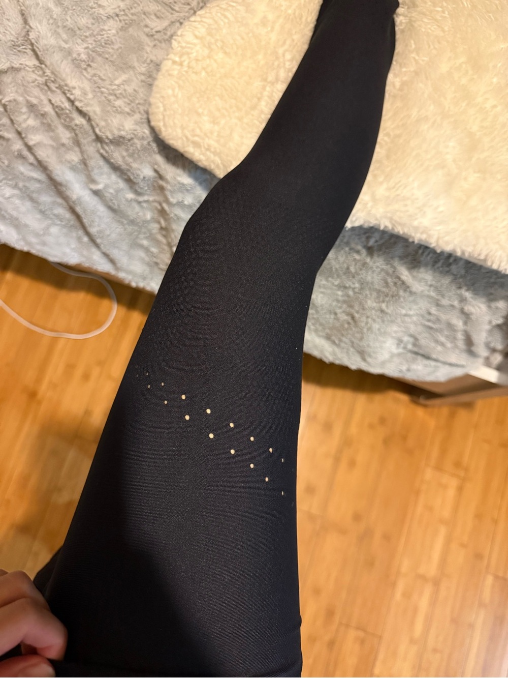 Lululemon Black High-Waist Full-Length Leggings with small holes along hem - Picture 3 of 3
